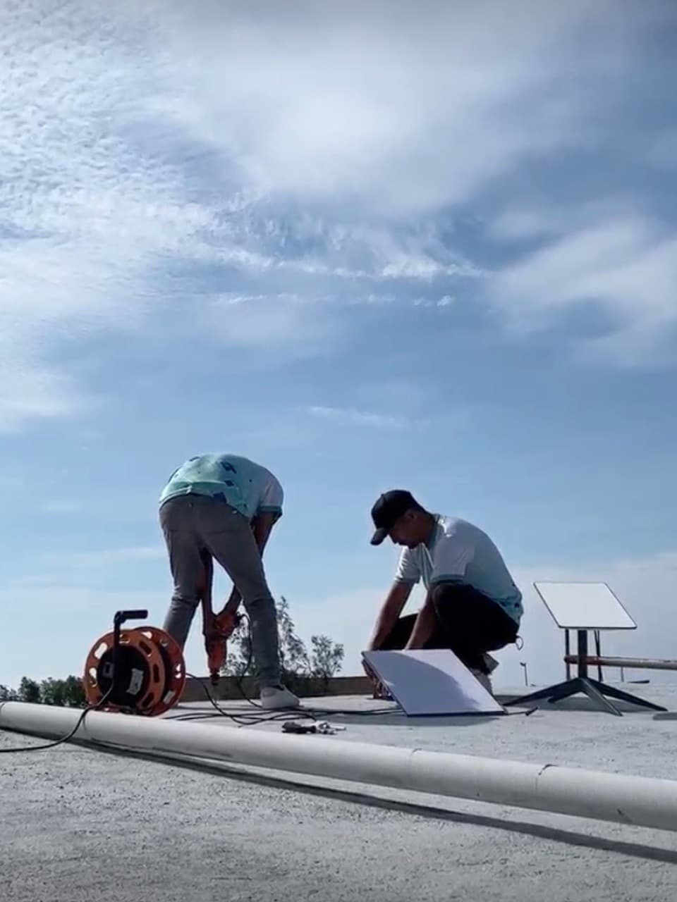 TechCare technician installing a Starlink dish